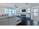 Stylish living room with a fireplace, TV, and balcony access; great for relaxation at 2551 Statesville Ave, Charlotte, NC 28206