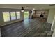 Open floor plan showcasing living room and kitchen with backyard access, ideal for entertaining at 2815 Cartesian Dr, Charlotte, NC 28214