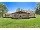 Expansive backyard featuring a covered patio, perfect for outdoor entertaining at 2942 Denwood Dr, Claremont, NC 28610