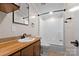Bathroom vanity featuring a shower and bathtub at 2942 Denwood Dr, Claremont, NC 28610