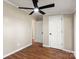 Spacious bedroom features a ceiling fan and hardwood flooring at 2942 Denwood Dr, Claremont, NC 28610