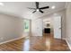 This bedroom has hardwood floors, a window, and a bathroom at 2942 Denwood Dr, Claremont, NC 28610