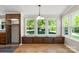 Dining Area with three large windows and a built in bench at 2942 Denwood Dr, Claremont, NC 28610