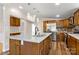 Modern kitchen with stainless steel appliances, center island, and ample cabinet space at 2942 Denwood Dr, Claremont, NC 28610