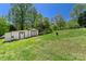 Outbuilding on lot has a porch and double doors at 2942 Denwood Dr, Claremont, NC 28610