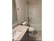 Clean bathroom featuring a single vanity, toilet, and shower-tub combo with neutral color palette at 3019 Glenn Hope Way, Matthews, NC 28104
