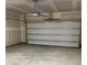 Spacious unfinished two-car garage with a concrete floor, drywall, and an automatic door opener at 3019 Glenn Hope Way, Matthews, NC 28104