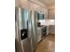 Kitchen with stainless steel appliances and grey cabinets at 3019 Glenn Hope Way, Matthews, NC 28104