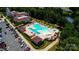 Aerial view of resort-style community pool featuring ample seating, covered areas, and surrounding landscaping at 3040 Azalea Dr, Indian Land, SC 29707
