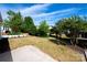 Well-maintained backyard featuring a healthy lawn, mature trees, and clean landscaping, perfect for outdoor enjoyment at 3040 Azalea Dr, Indian Land, SC 29707