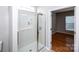 Bathroom with white shower and view to the bedroom through the door at 3040 Azalea Dr, Indian Land, SC 29707