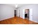 Spacious bedroom with wood floors, ceiling fan, and access to the bathroom at 3040 Azalea Dr, Indian Land, SC 29707