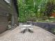 Backyard patio with room to entertain featuring a patio table and grill at 3232 Johnny Cake Ln, Charlotte, NC 28226