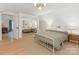 Inviting bedroom with mirrored closet, neutral carpet, and sloped ceiling at 3232 Johnny Cake Ln, Charlotte, NC 28226