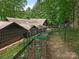 A beautiful garden with raised beds sits adjacent to this well-maintained home at 3232 Johnny Cake Ln, Charlotte, NC 28226