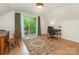 Bright home office with hardwood floors, balcony, and natural light at 3232 Johnny Cake Ln, Charlotte, NC 28226