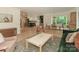 Spacious living room seamlessly connected to the kitchen and dining areas at 3232 Johnny Cake Ln, Charlotte, NC 28226
