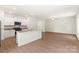 Spacious kitchen with a center island, white cabinetry, and stainless-steel appliances at 3340 Burberry Dr, Gastonia, NC 28052