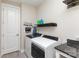 Laundry room featuring a new washer and dryer set, and granite countertops at 4237 Island Fox Ln, Denver, NC 28037