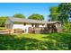 Lovely backyard featuring a spacious deck, screened porch, and well-maintained lawn at 4307 Wrangler Sw Dr, Concord, NC 28027