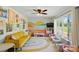 Vibrant playroom with bright colors, a TV, and ample space for play at 4307 Wrangler Sw Dr, Concord, NC 28027