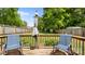 Spacious backyard with a wood fence, an umbrella and outdoor seating at 505 Tea Olive Ct, Rock Hill, SC 29732