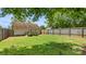 Large backyard with a wood fence and plenty of green space at 505 Tea Olive Ct, Rock Hill, SC 29732
