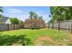 Large backyard with a wood fence and plenty of green space at 505 Tea Olive Ct, Rock Hill, SC 29732