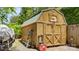 Wooden barn next to gravel in the backyard at 505 Tea Olive Ct, Rock Hill, SC 29732