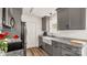 Modern kitchen features gray cabinetry, stainless steel appliances, and granite countertops. A new home awaits! at 505 Tea Olive Ct, Rock Hill, SC 29732