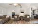 Inviting living room showcasing hardwood floors and light-filled, neutral walls to complement the bedroom at 505 Tea Olive Ct, Rock Hill, SC 29732