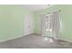 Cozy bedroom with plush carpet, a window with curtains, and a closet for optimal storage at 520 Steeple Chase Trl, Salisbury, NC 28144