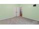 Inviting bedroom with carpet and fresh paint, complete with a closet, electrical outlets, and a neutral backdrop at 520 Steeple Chase Trl, Salisbury, NC 28144