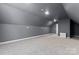 Spacious carpeted bonus room with recessed lighting and a neutral color scheme, perfect for a home office or playroom at 520 Steeple Chase Trl, Salisbury, NC 28144