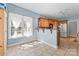 Cozy kitchen featuring an open breakfast nook and tiled flooring at 520 Steeple Chase Trl, Salisbury, NC 28144