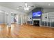 Expansive living room with hardwood floors, built-in shelving, and seamless entry to the foyer at 520 Steeple Chase Trl, Salisbury, NC 28144