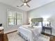 Cozy bedroom with a ceiling fan, natural light, and a calming color scheme at 5933 Legacy Ln, Kannapolis, NC 28081