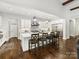 Bright kitchen featuring a large island, stainless steel appliances, and wood floors at 5933 Legacy Ln, Kannapolis, NC 28081