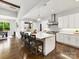 Elegant kitchen featuring a large island with seating and pendant lighting at 5933 Legacy Ln, Kannapolis, NC 28081