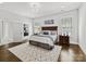 Serene main bedroom with wood floors, natural light, and ample closet space at 5933 Legacy Ln, Kannapolis, NC 28081