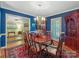 Spacious dining room with hardwood floors, chandelier, and traditional decor at 5935 Winburn Ln, Charlotte, NC 28226