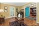 Comfortable living area with hardwood floors, natural light, and classic details at 5935 Winburn Ln, Charlotte, NC 28226