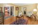 Cozy living room featuring hardwood floors, elegant decor, and classic furnishings at 5935 Winburn Ln, Charlotte, NC 28226