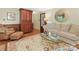 Comfortable living room with a neutral palette, glass coffee table, and area rug shows a cozy space at 5935 Winburn Ln, Charlotte, NC 28226