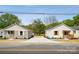 Charming matching homes feature fresh landscaping and a shared driveway at 606 & 608 Hampton Rd, Lancaster, SC 29720