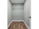This laundry room has durable floors, practical shelving, and utility hookups for efficient chore management at 606 & 608 Hampton Rd, Lancaster, SC 29720