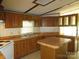 The kitchen has ample cabinet space and a functional island, providing space for storage and preparation at 6293 Karen Dr, Claremont, NC 28610