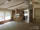 Spacious living area with seamless flow to kitchen, abundant natural light creating a welcoming atmosphere at 6293 Karen Dr, Claremont, NC 28610