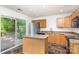 Modern kitchen featuring stainless steel appliances, granite countertops, and a large island at 7607 Petrea Ln, Charlotte, NC 28227