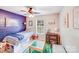 Cozy bedroom with colorful accent wall, a playful theme, and natural light from the window at 812 Timber Creek Dr, York, SC 29745